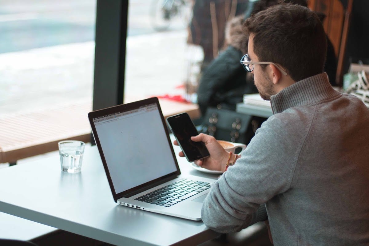 Image of a man on a computer.