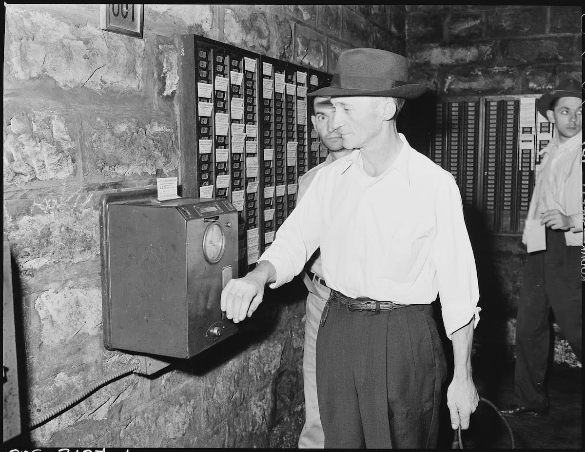 Harry Fain Coal Loader Checks Out In The Afternoon After Cleaning Up After Work. Inland Steel Company Wheelwright...   NARA   541444