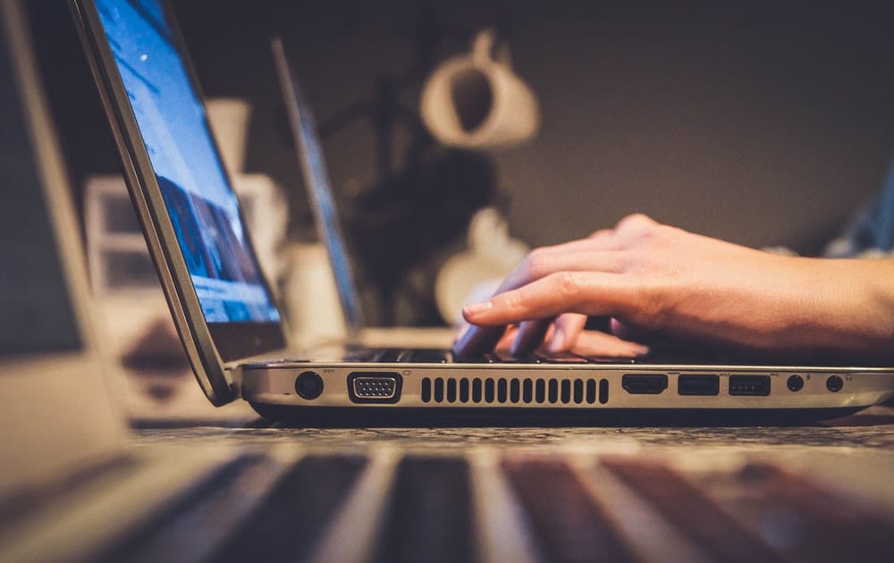 Person coding a computer 