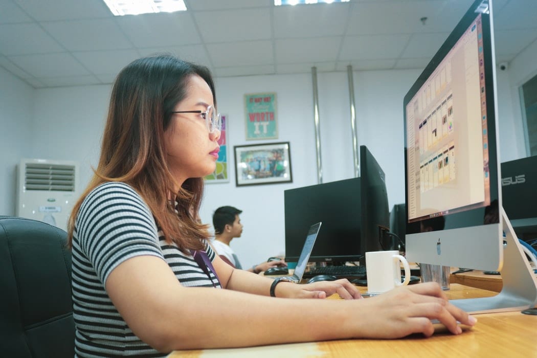 Woman working at a computer 