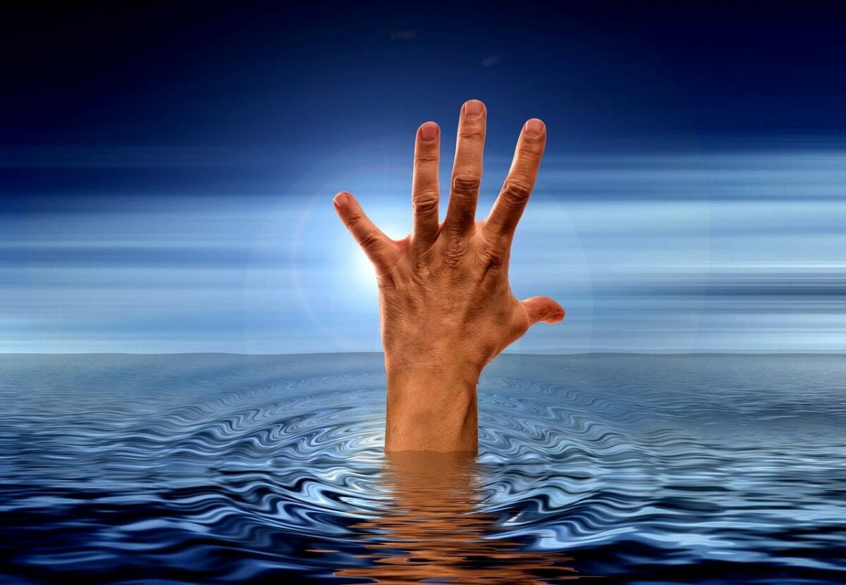 hand reaching out of water, to symbolize code newbies reaching out of tutorial purgatory