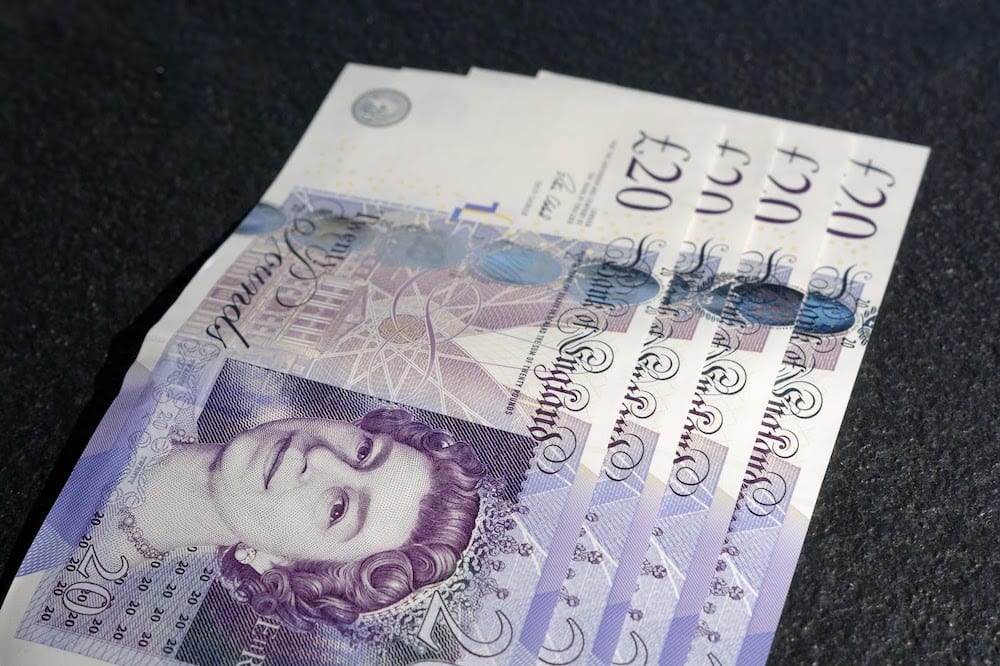 English pounds fanned out in preparation for the payment of a University of Manchester coding bootcamp.