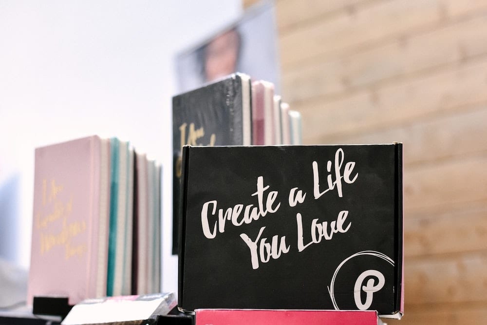 Sign written in chalk, “Create a life you love”.