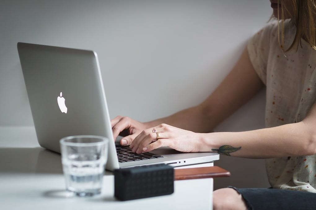 A person using a laptop.