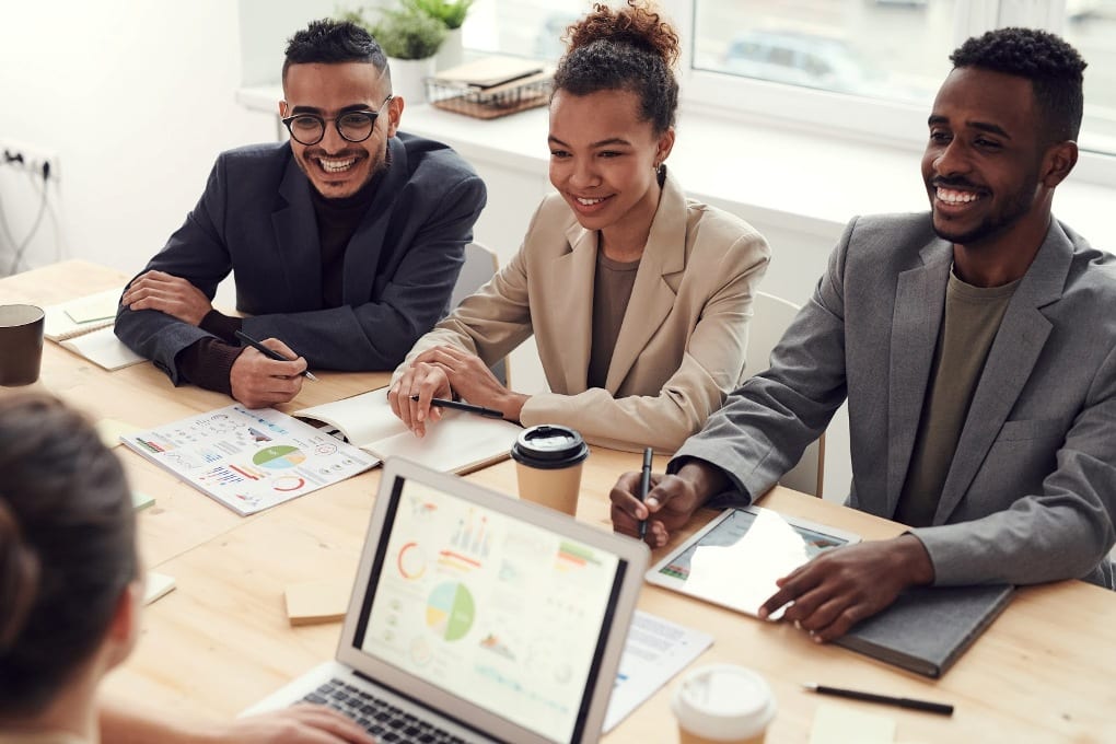 Three people at work