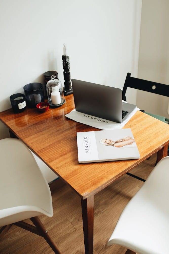 Silver Macbook On Brown Wooden Table 3847580