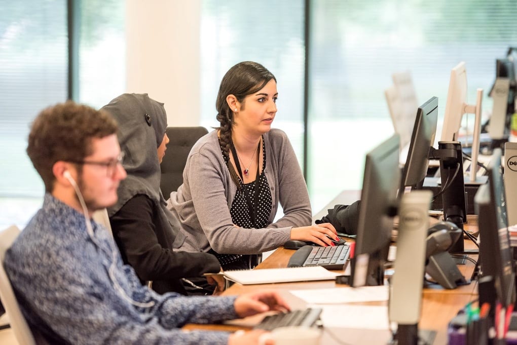 A group of people working in an office