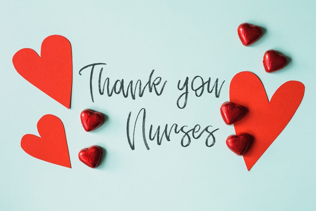 A gratitude message for nurses surrounded by red hearts.
