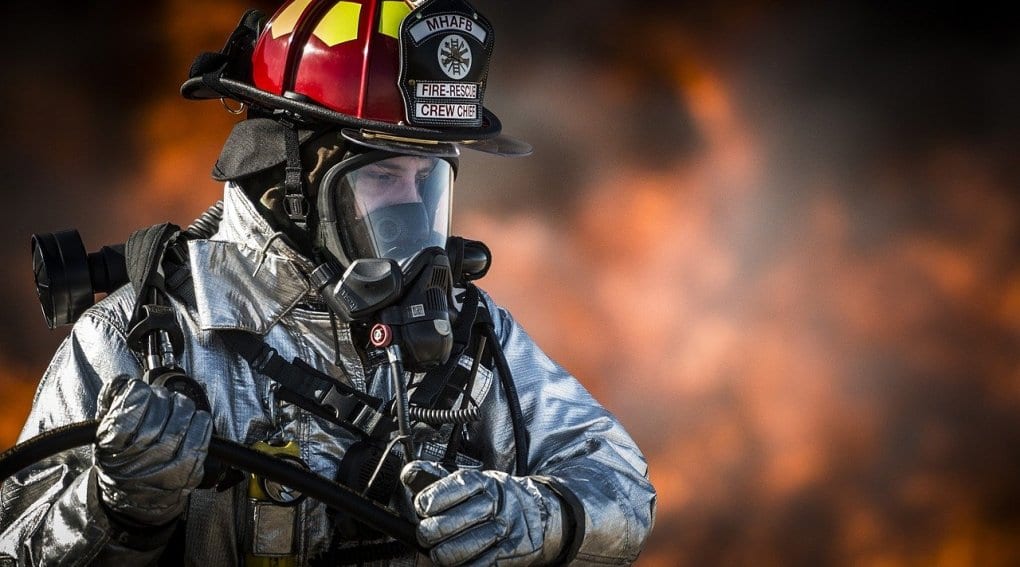 A firefighter trying to put out a fire