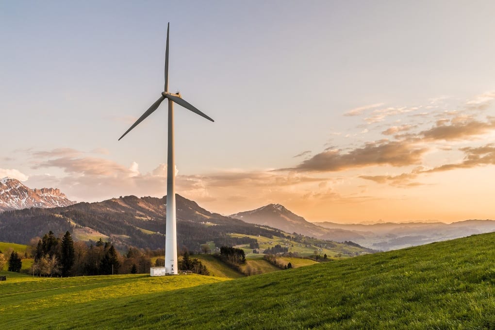 white wind energy in the green countryside