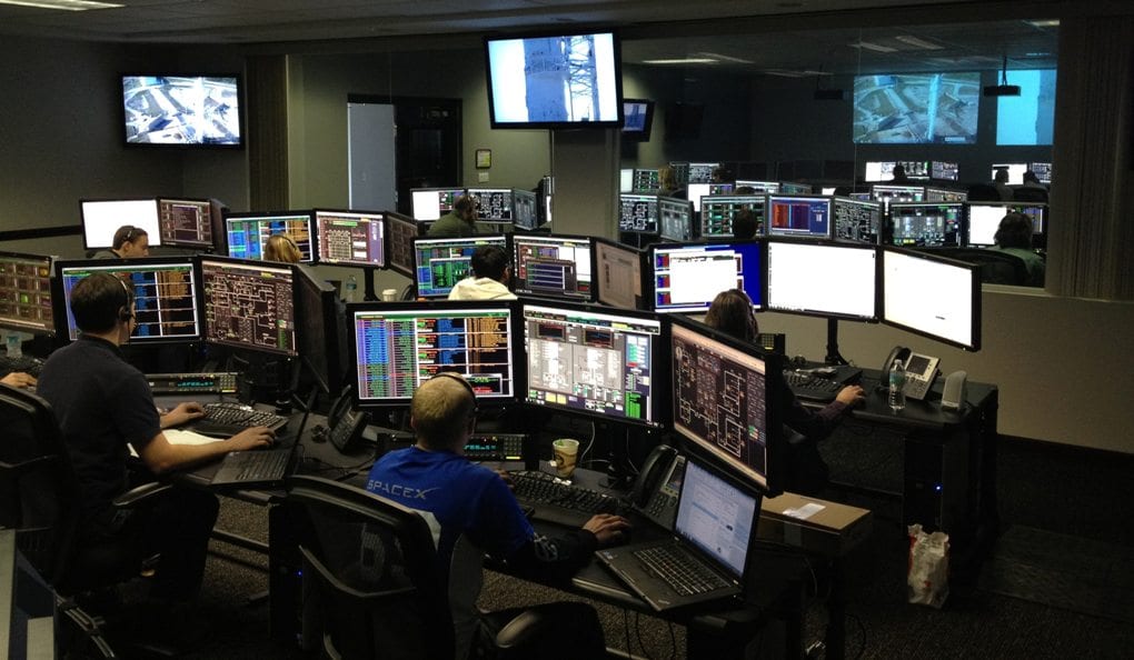 People working in a computer room