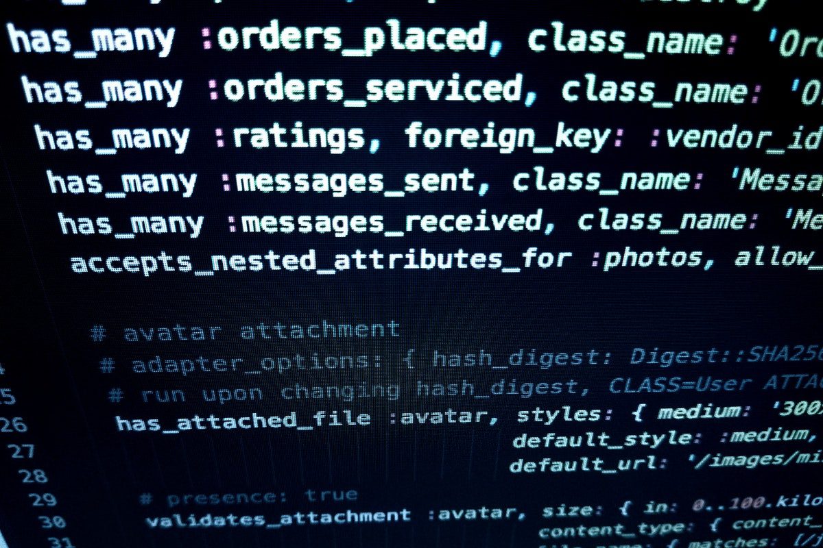 Code displayed on a black screen. How to Become an AWS Developer