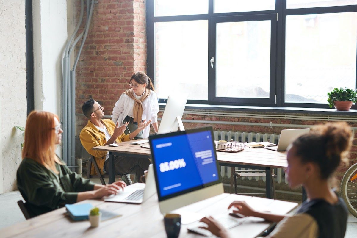  People working in an office how to become an applications architect