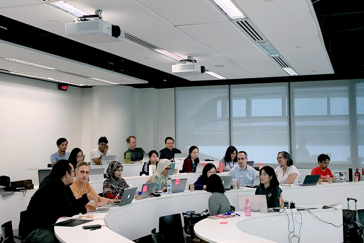 Students using laptops during a class. How to Become a Product Manager