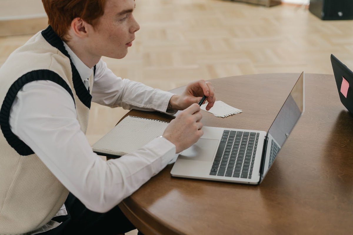  A man looking at his laptop screen Online NET Courses, Classes, and Training 