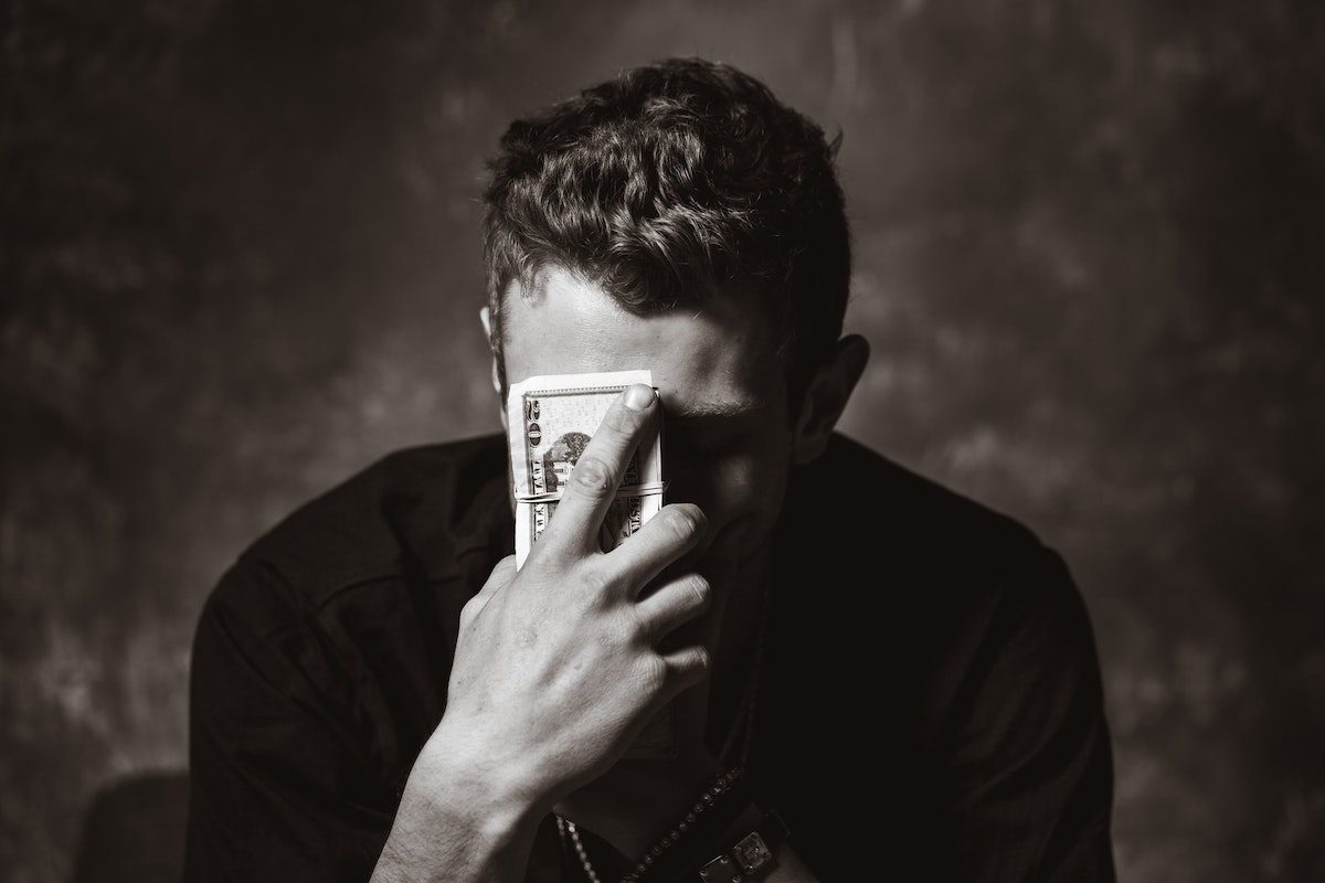 A person undergoing job training holding a bundle of money. Best Jobs Without a Degree