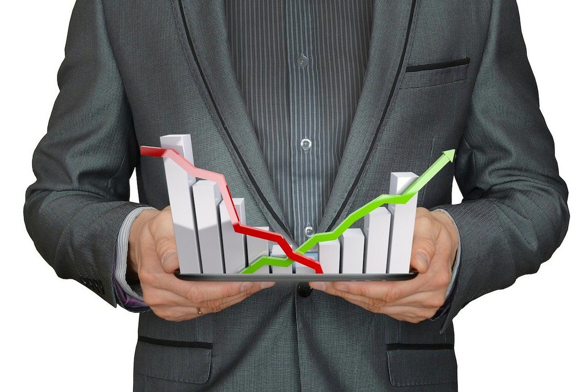 A man holding a 3D graph. Business Analyst Tools