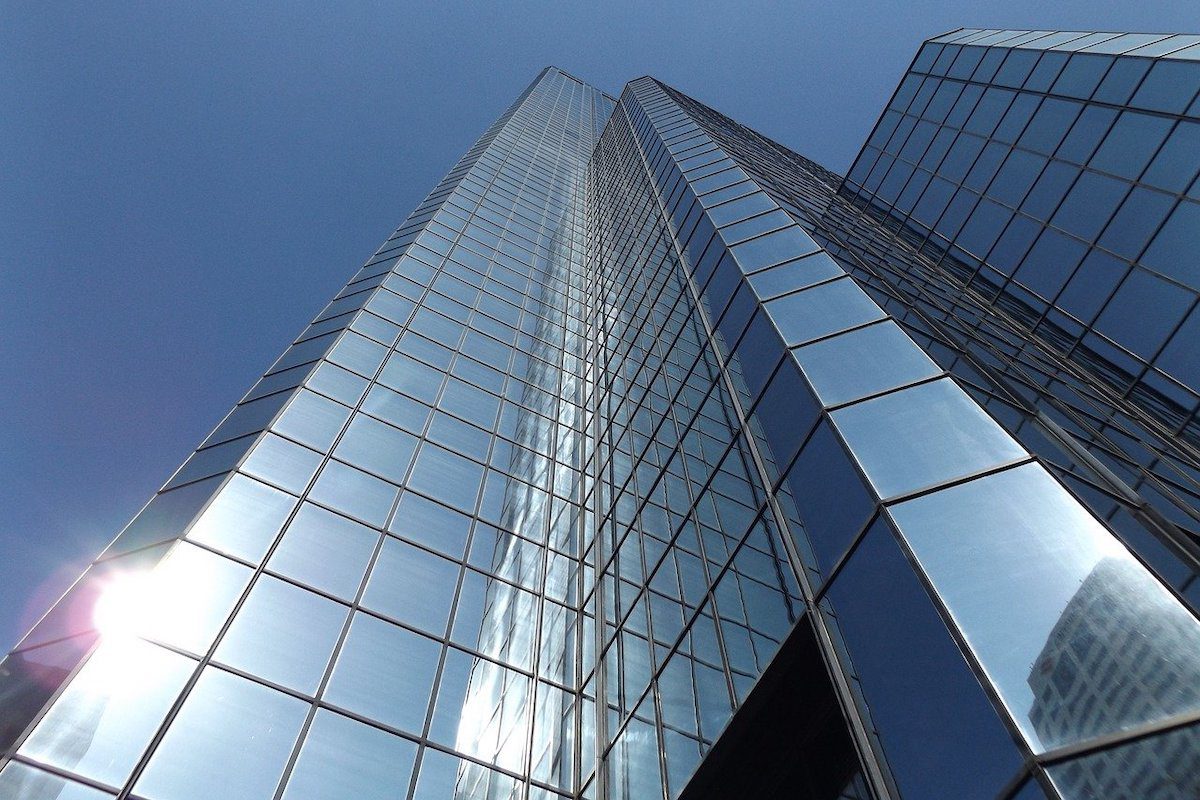 A view of a tall corporate building. What Industry Hires The Most Web Developers