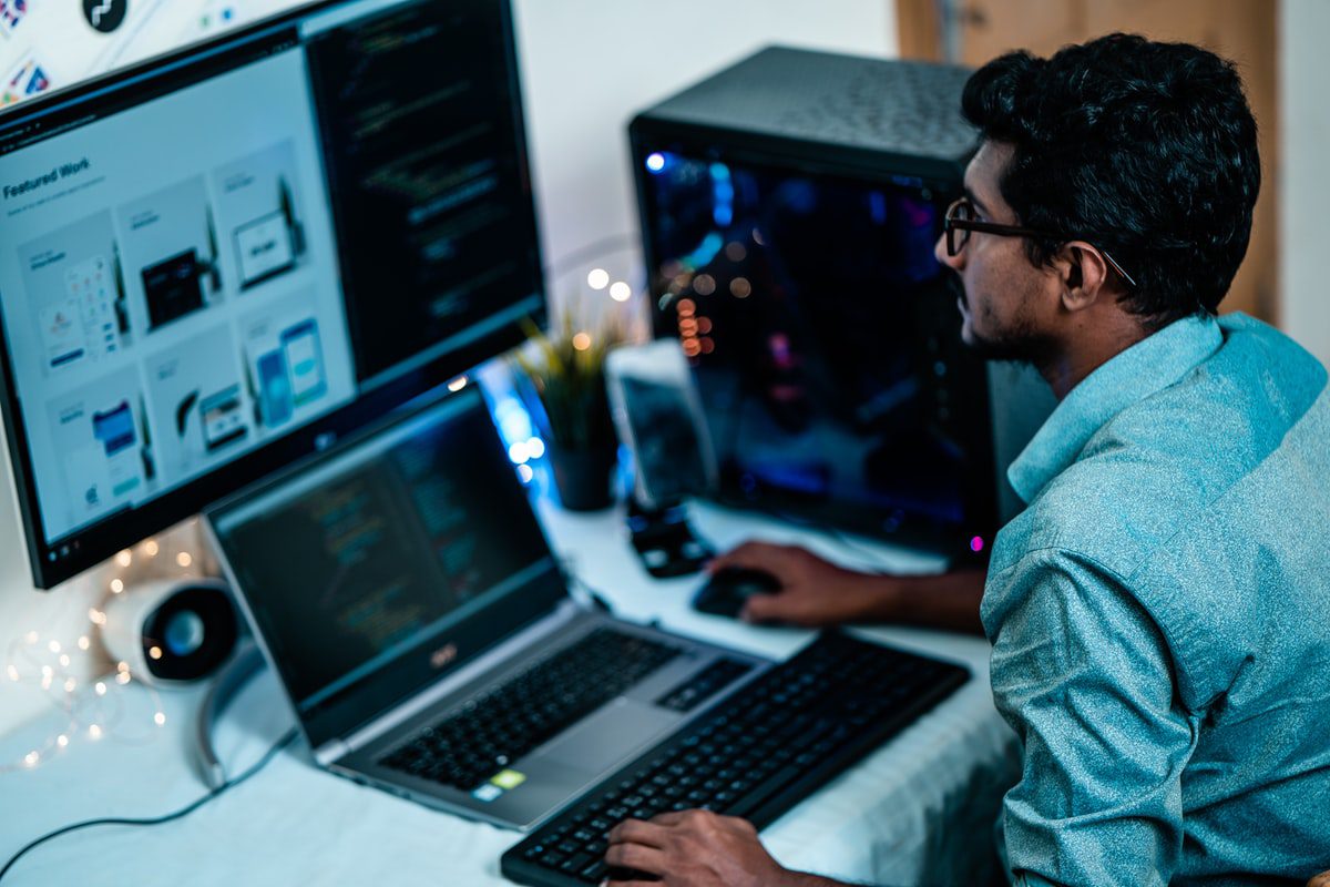 Person installing an OS into a newly built computer after adding a boot drive