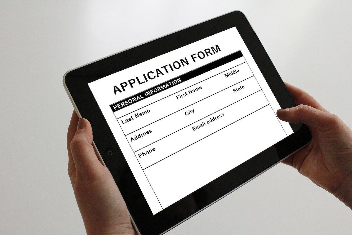 A person holding a tab displaying an application form for a job. How To Get An Internship At ByteDance