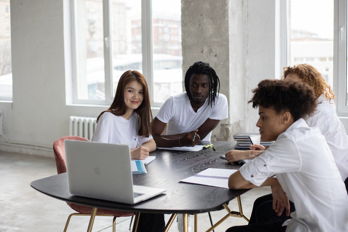 a group of distance learners taking virtual classes