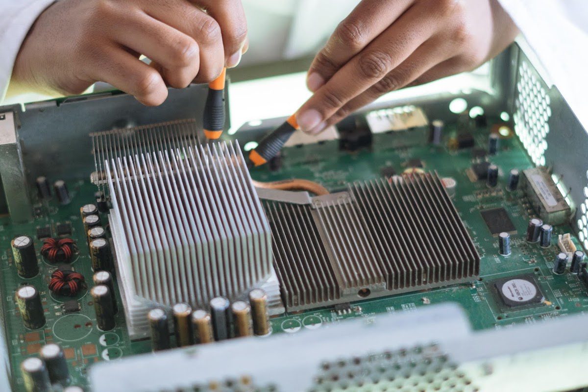 An engineer working on complex electrical components. A Day in the Life of an Electrical Engineer