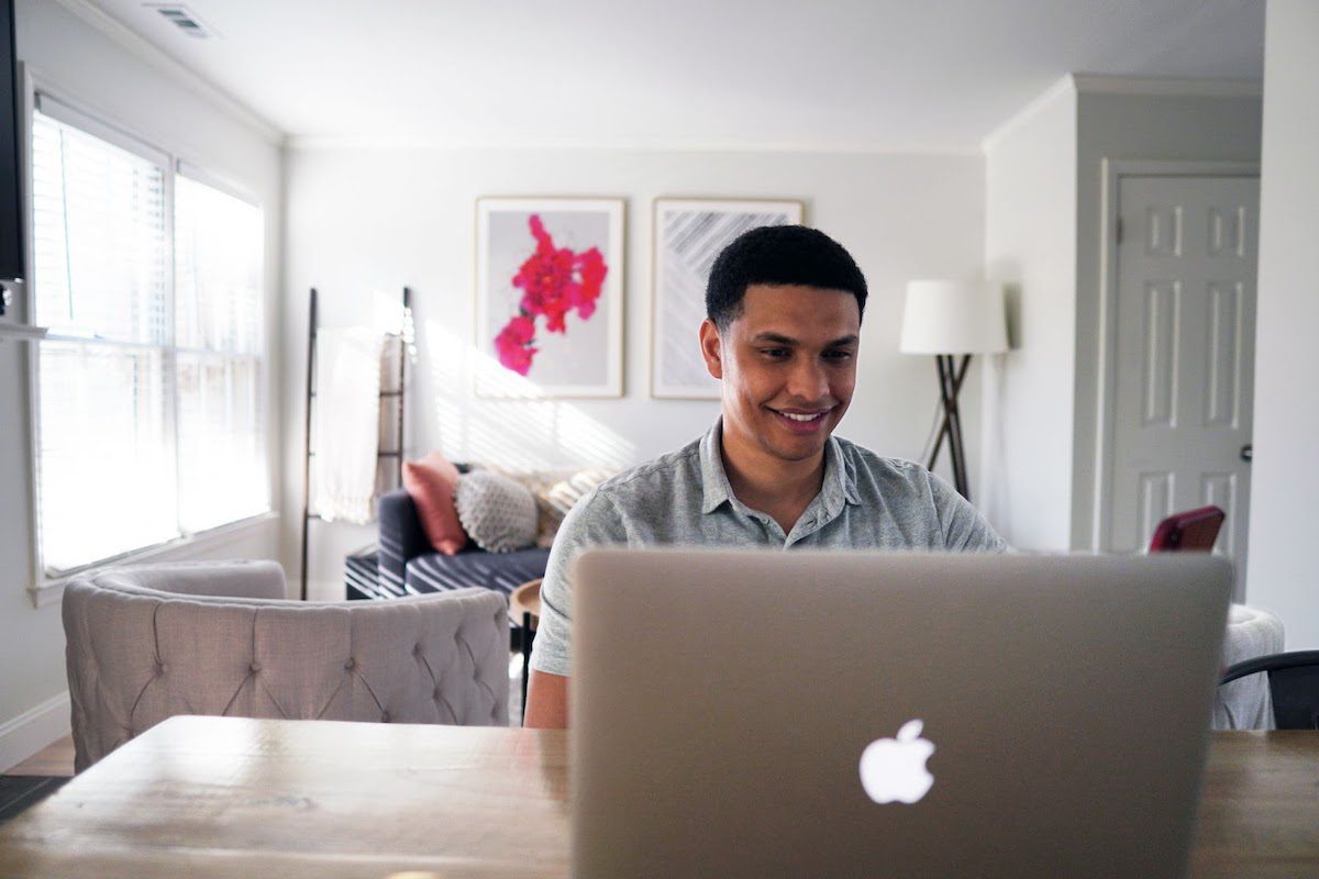 A man working on his laptop in a casual workspace Best Laptops For Data Science