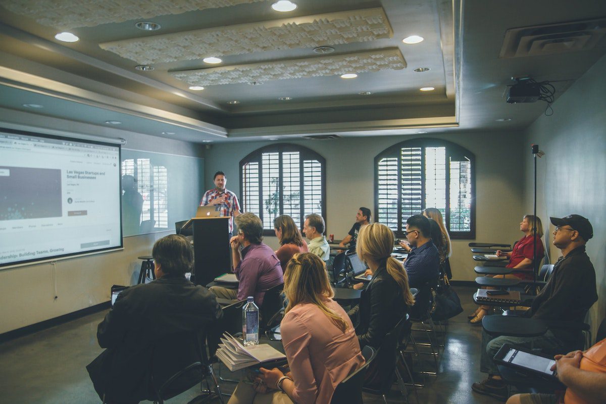 Adult students learning in a classroom