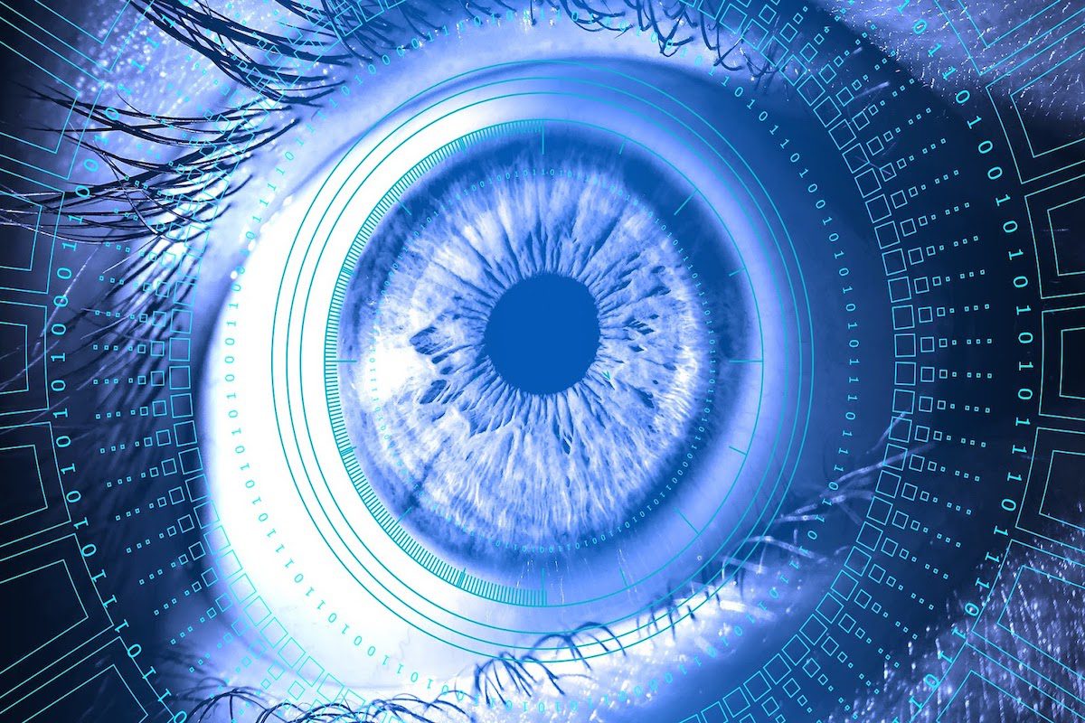 a large blue eye looking through a web of digitized information to examine real-life cyber incidents
