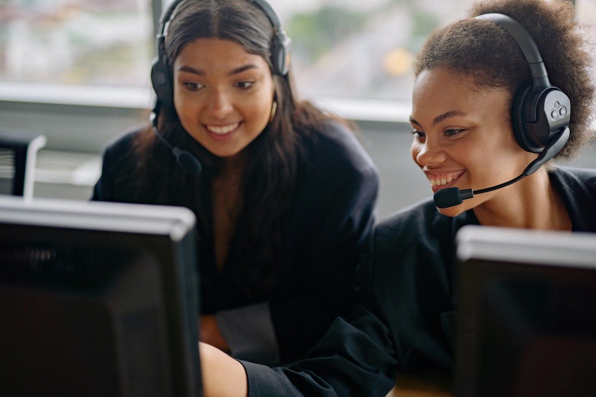 Two people sit at a table and discuss school rankings Highest-Paying Jobs in Texas