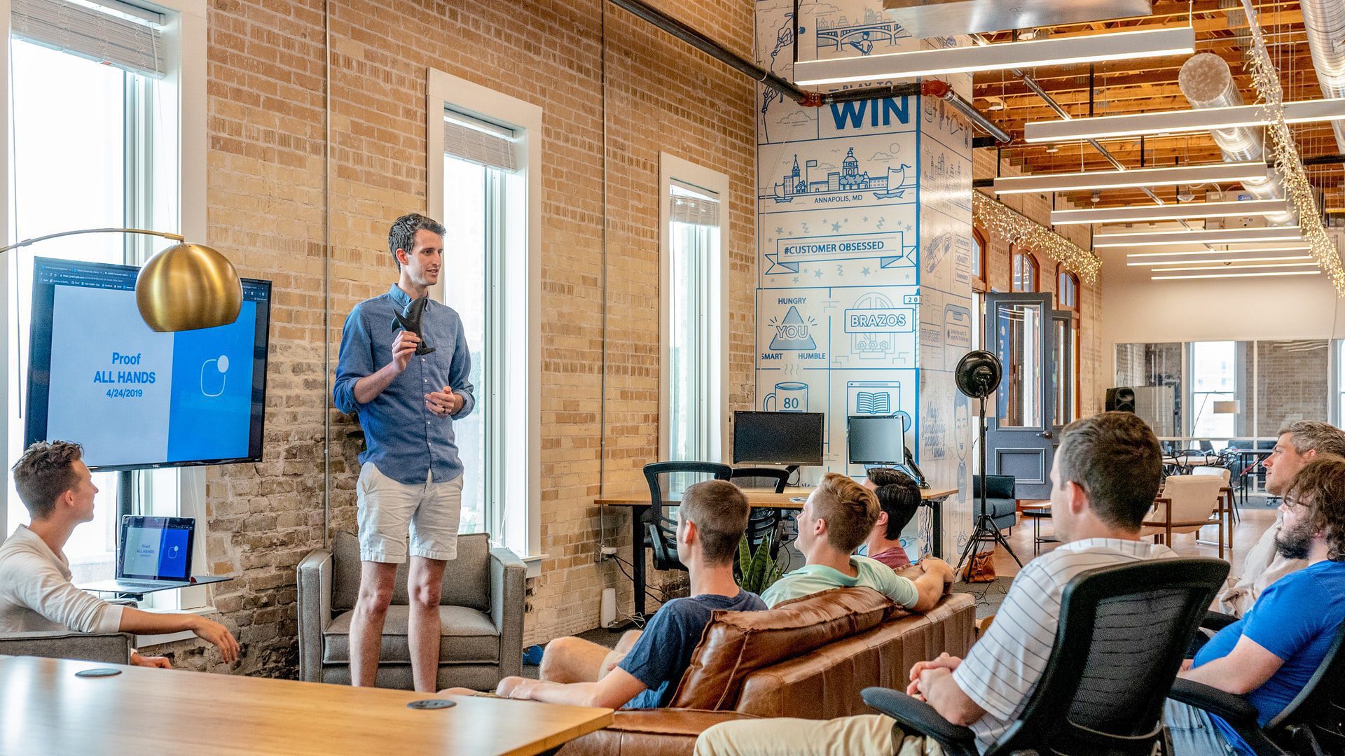 A group of people in a work meeting.