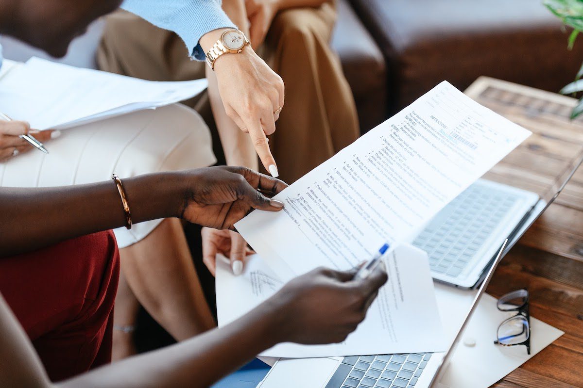 A group of project managers review a project’s costs and expenditures Best Major for Project Management