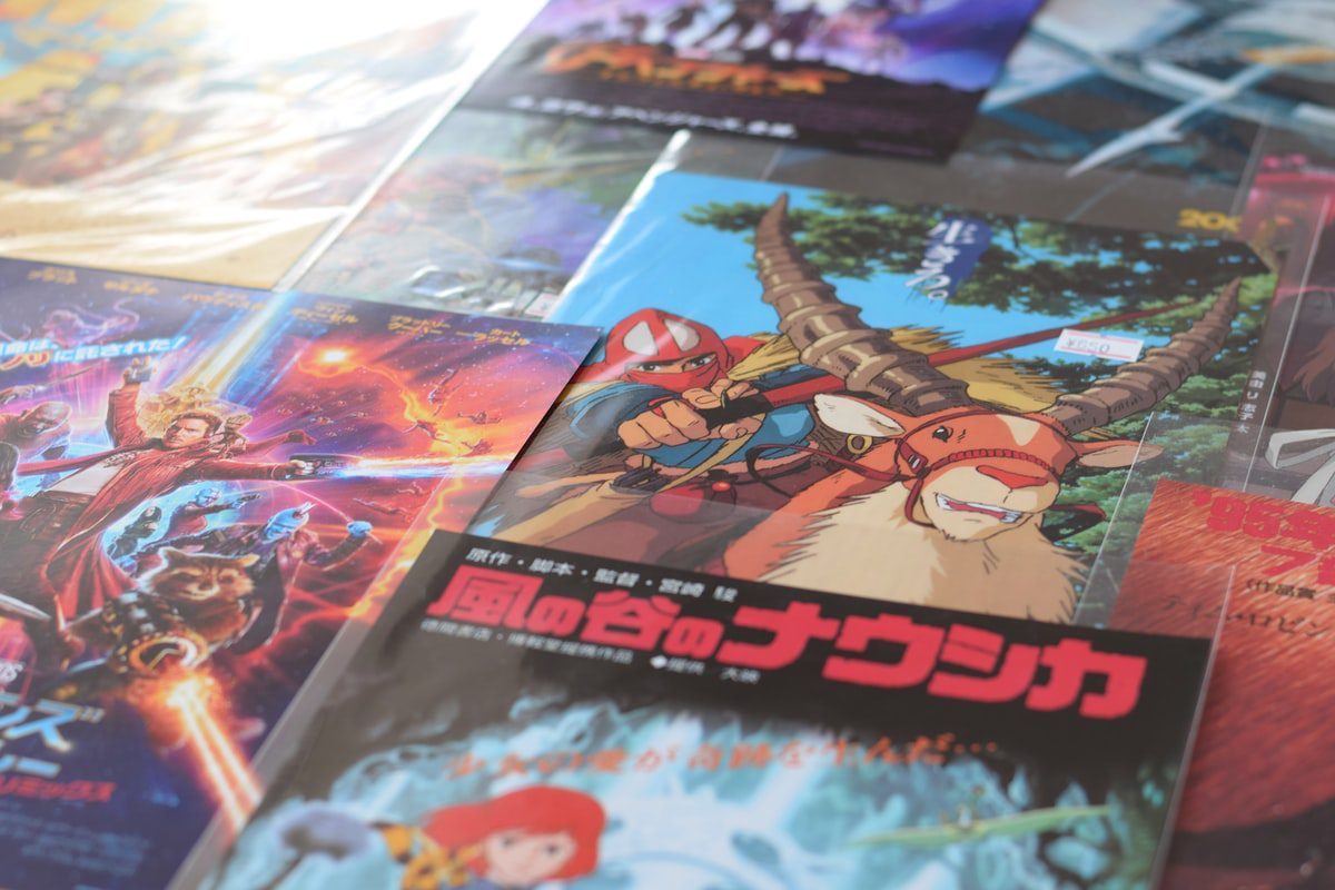 Various colorful animated video games in plastic sleeves