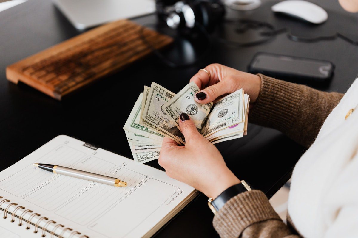 A person counting money.