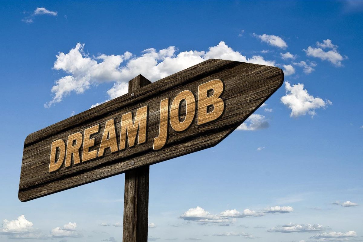 A sign displaying “dream job.”