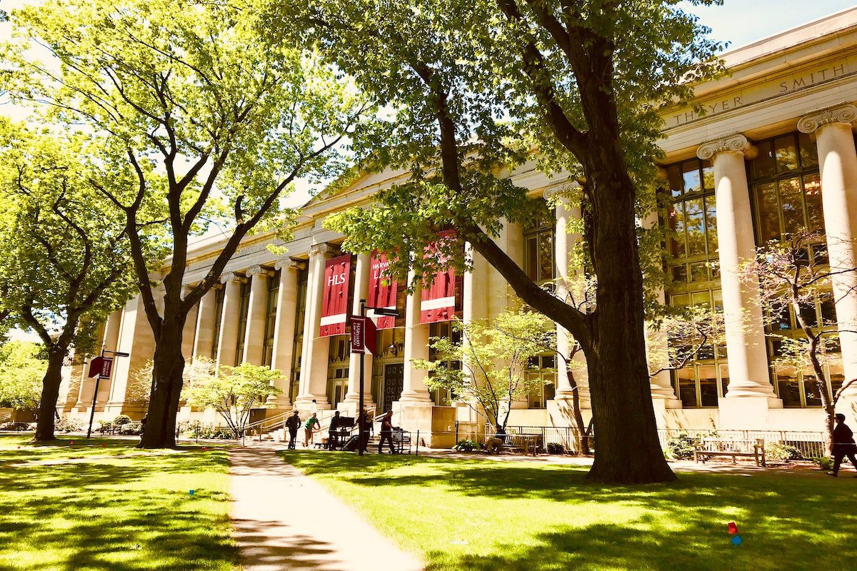 A picture of a Harvard University building in the summer. 