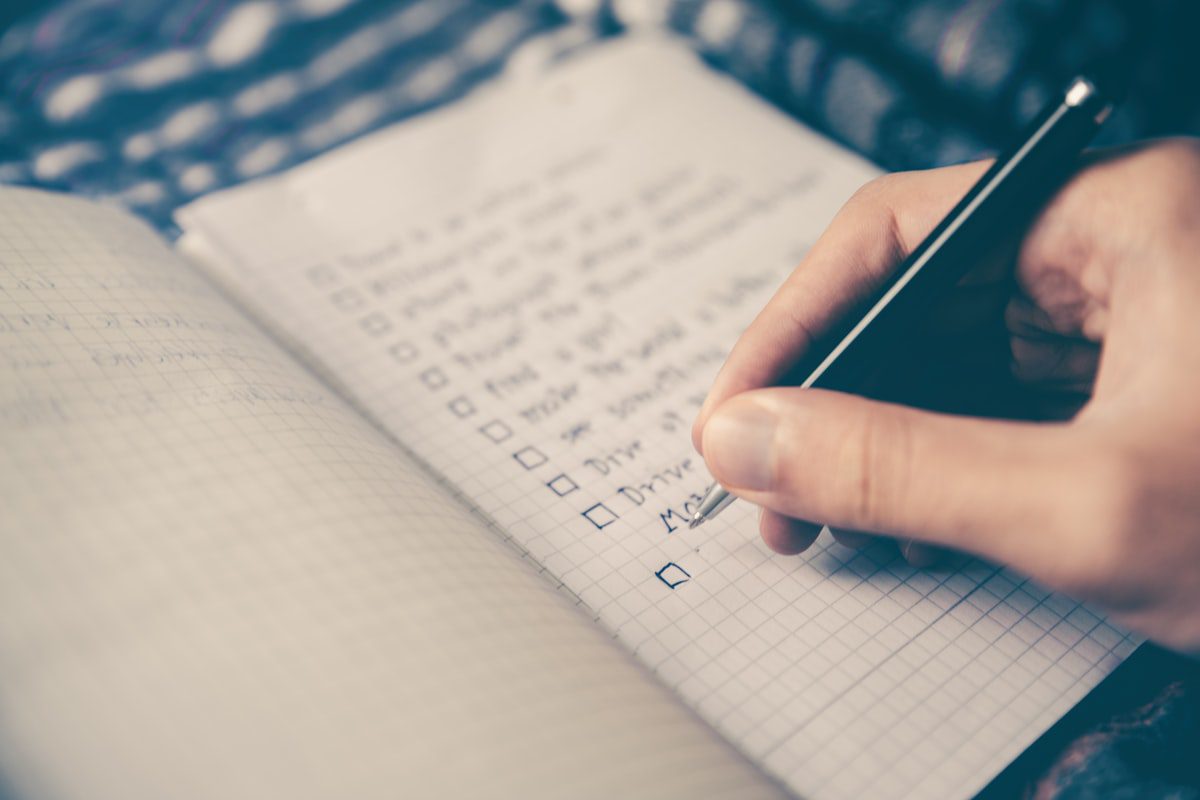 A student making a checklist