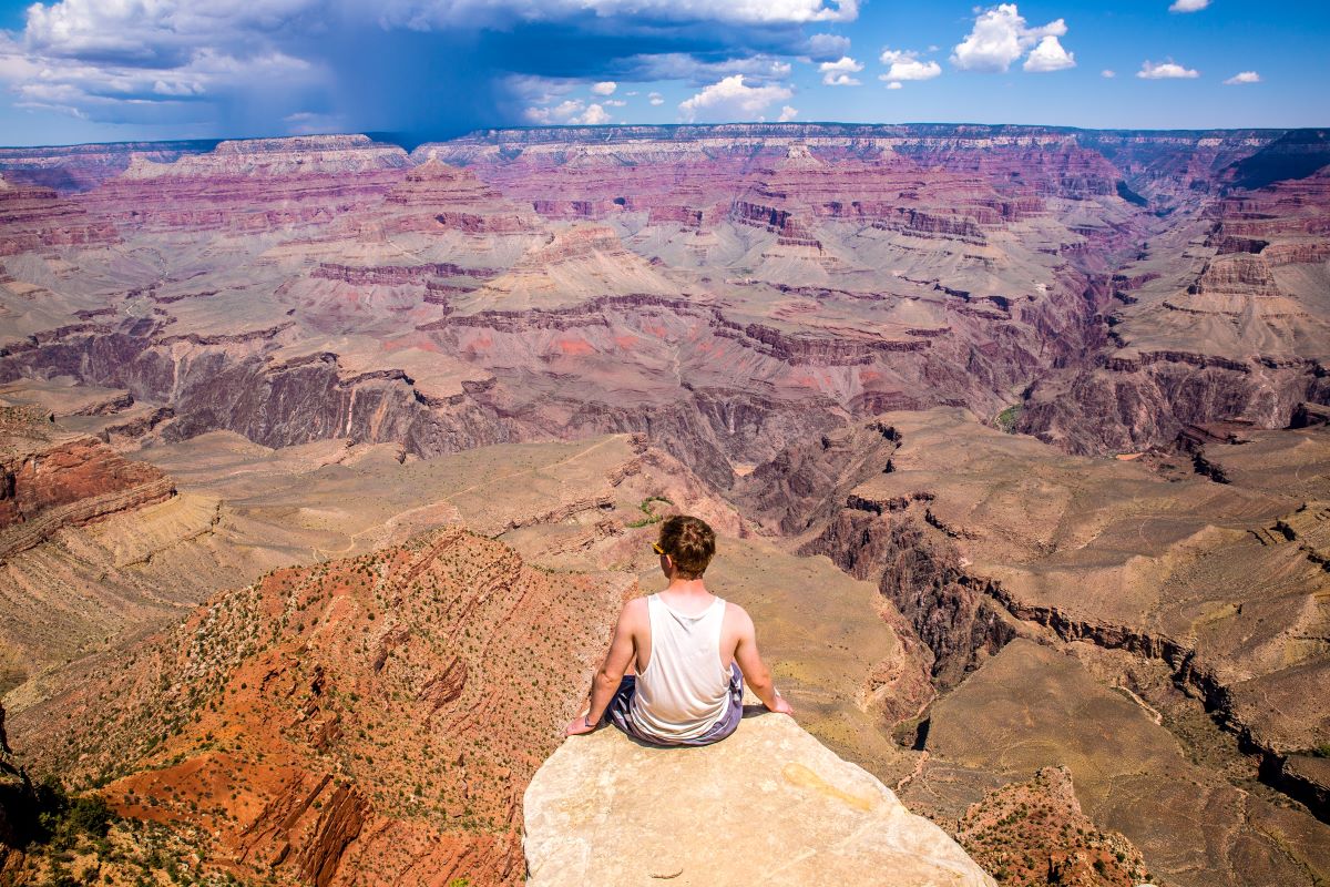  A person enjoys a view from the Grand Canyon National Park in Arizona. 