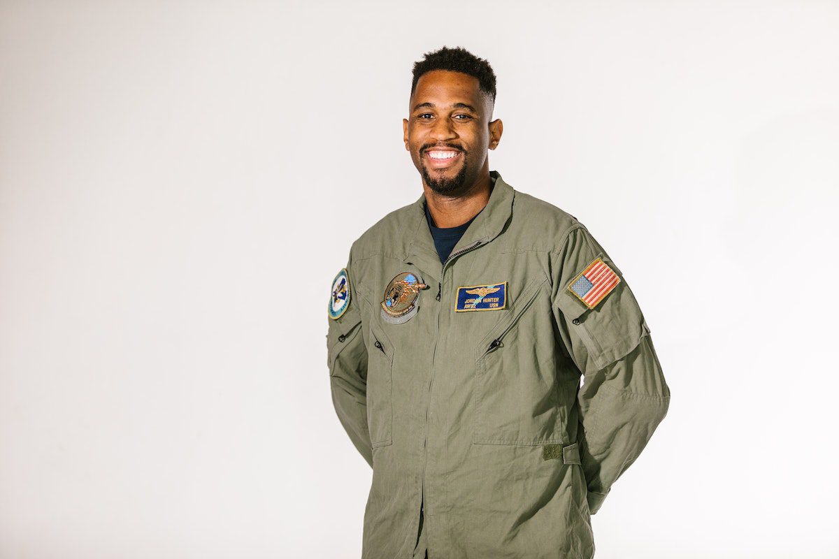 A male veteran smiling for the camera.