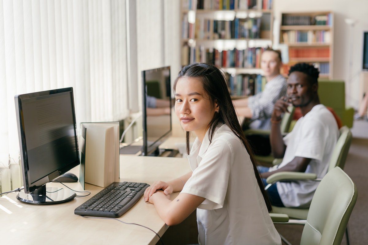 A diverse group of students studying to become cloud engineers.